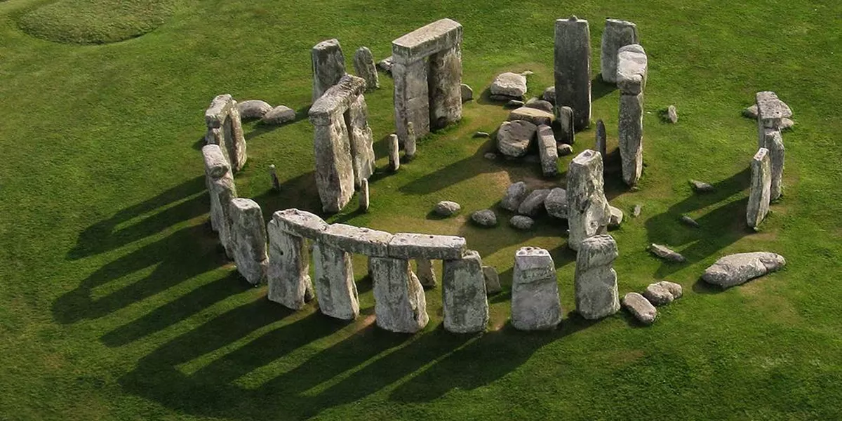 An aerial view of Stonehenge in a grassy field
