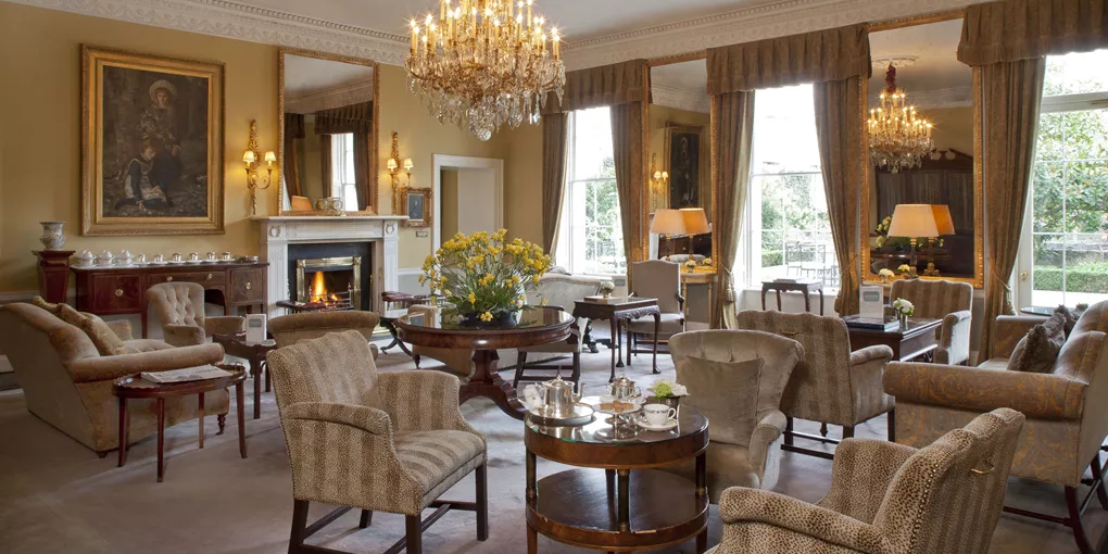 Drawing room with lots of chairs and tables in the Merrion Hotel in Dublin